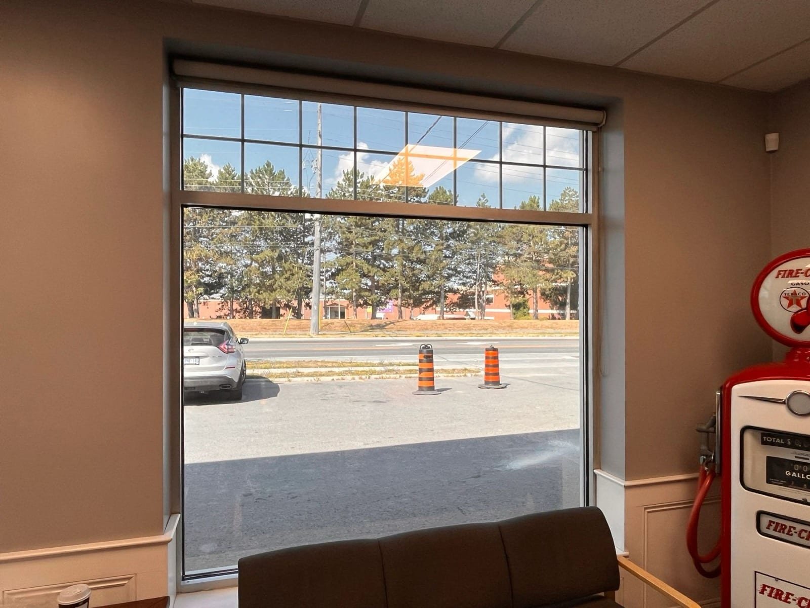 Commercial interior with large filmed storefront window